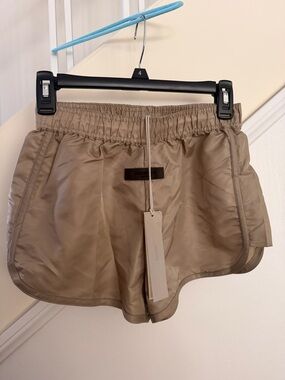 Fear of God ESSENTIALS Tan Satin Drawstring Shorts